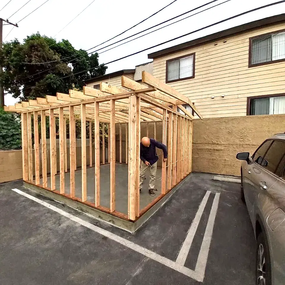 Handyman building custom wood framing structure